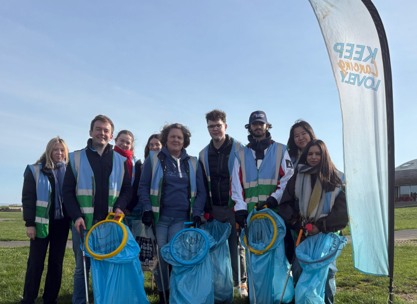 Tom Rutland MP at a litter pick on Lancing beach green.